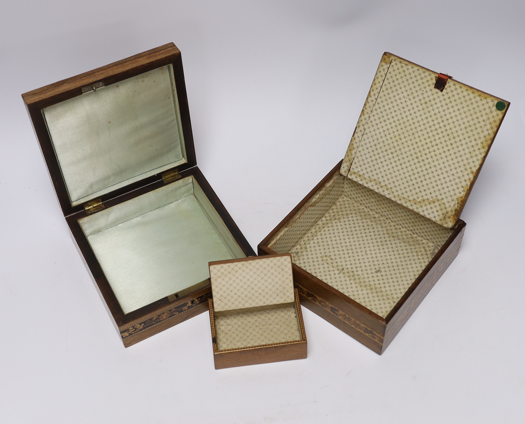 Three Tunbridgeware boxes, two decorated with perspective cube Marketree, the third with floral tesserae mosaic, largest 15.5cm
